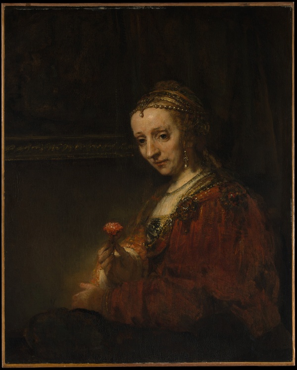 Woman with a Pink - Rembrandt van Rijn (early 1660s)